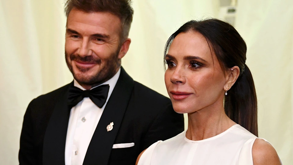 Victoria Beckham wows in body-gliding dress for glamorous night out with husband David